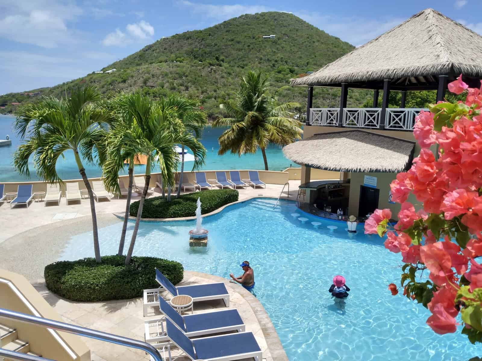 Caribbean resort pool area with swim up pool bar