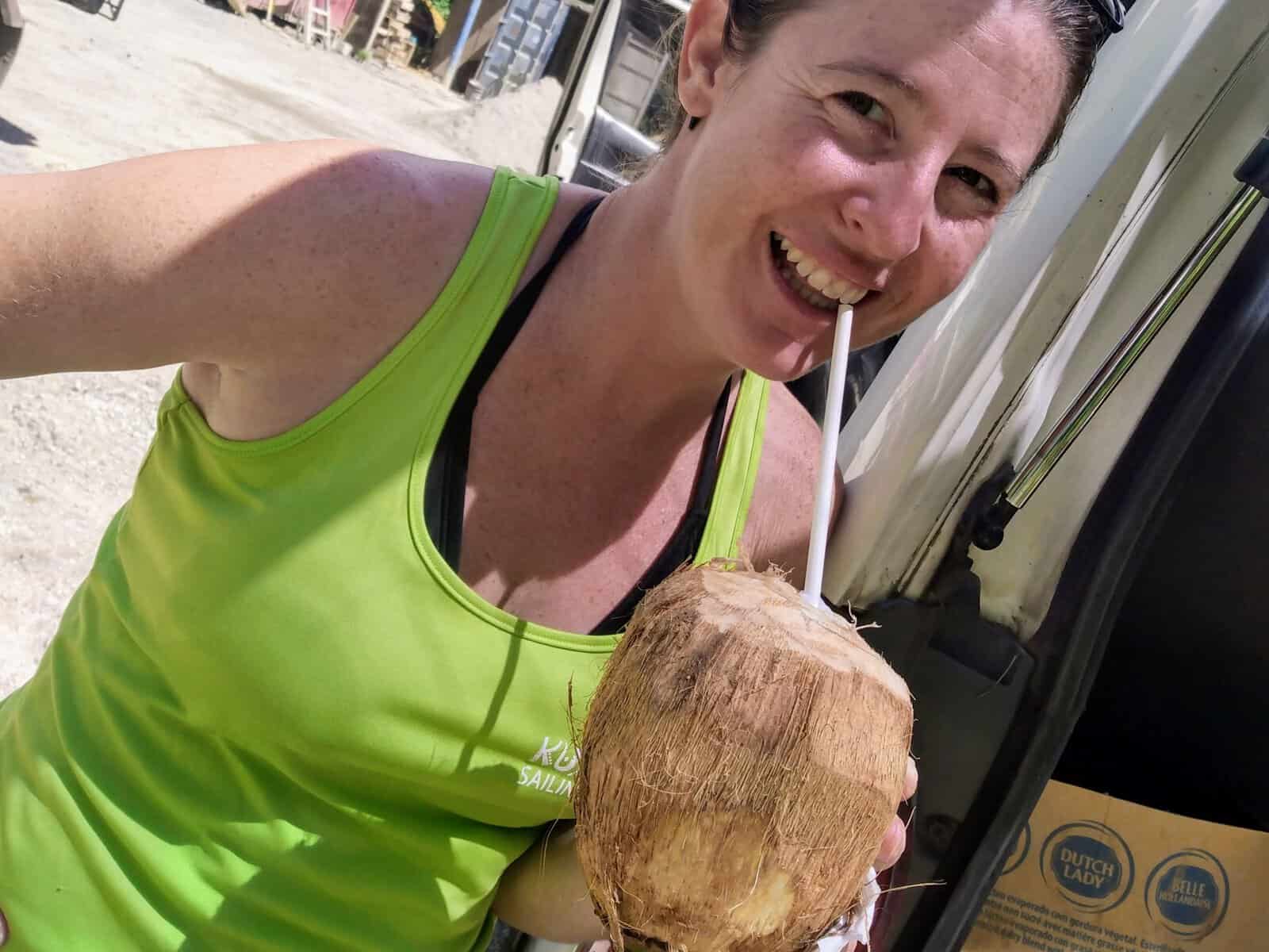 Mandy drinking out of a coconut in the British Virgin Islands