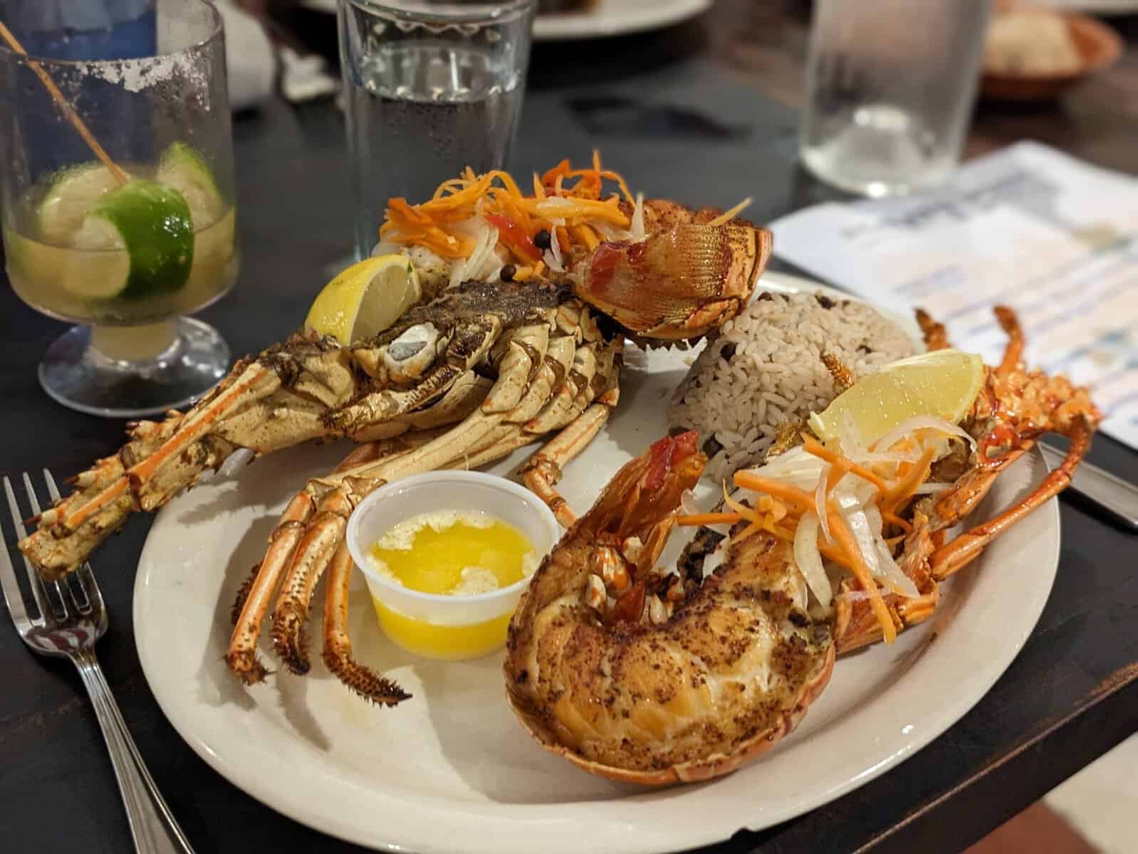 plate with lobster and rice and peas showcases British Virgin Islands food