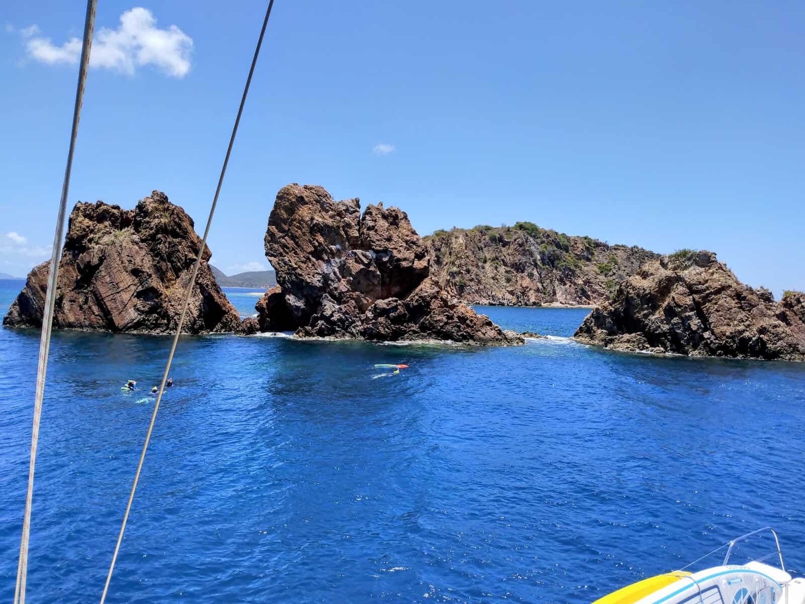 People snorkeling at The Indians, 3 giant rock formations in the British Virgin Islands