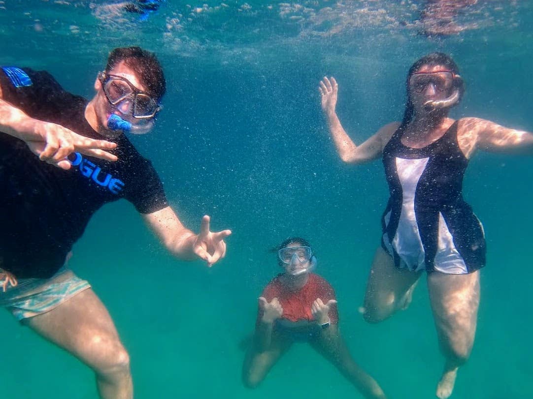 3 people snorkeling in the British Virgin Islands