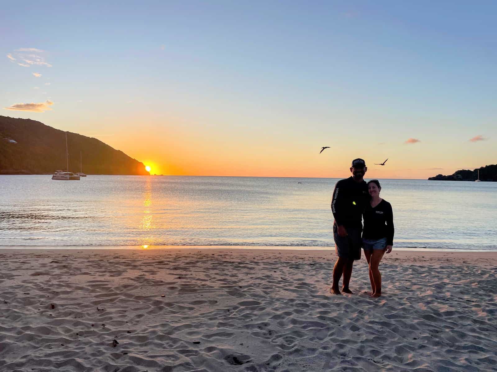 Brewer's Bay Beach on Tortola, Joe & Mandy standing on beach at sunset